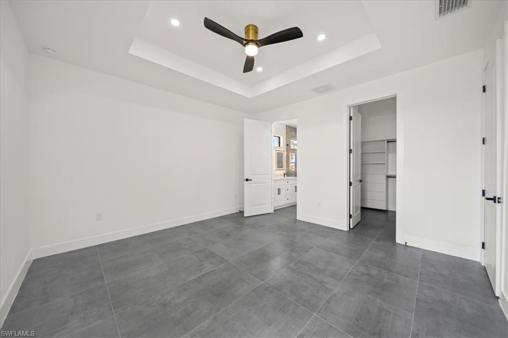 Spacious primary suite designed with comfort and sophistication in mind