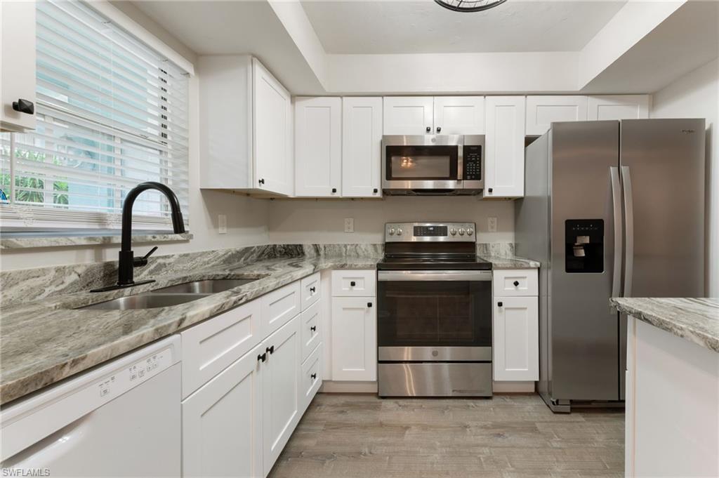 28230 Pine Haven Way #66 Bonita Springs FL 34135 - Stainless appliances and granite countertops