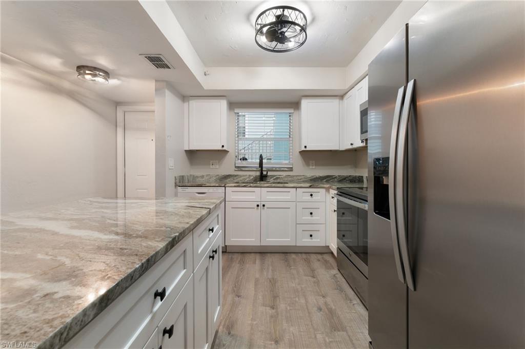 28230 Pine Haven Way #66 Bonita Springs FL 34135 - Updated kitchen features soft close drawers and doors