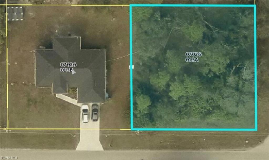 Aerial Property Survey. Overhead documentation showing the property structure, driveway access, and surrounding land parcels with dimensional notations