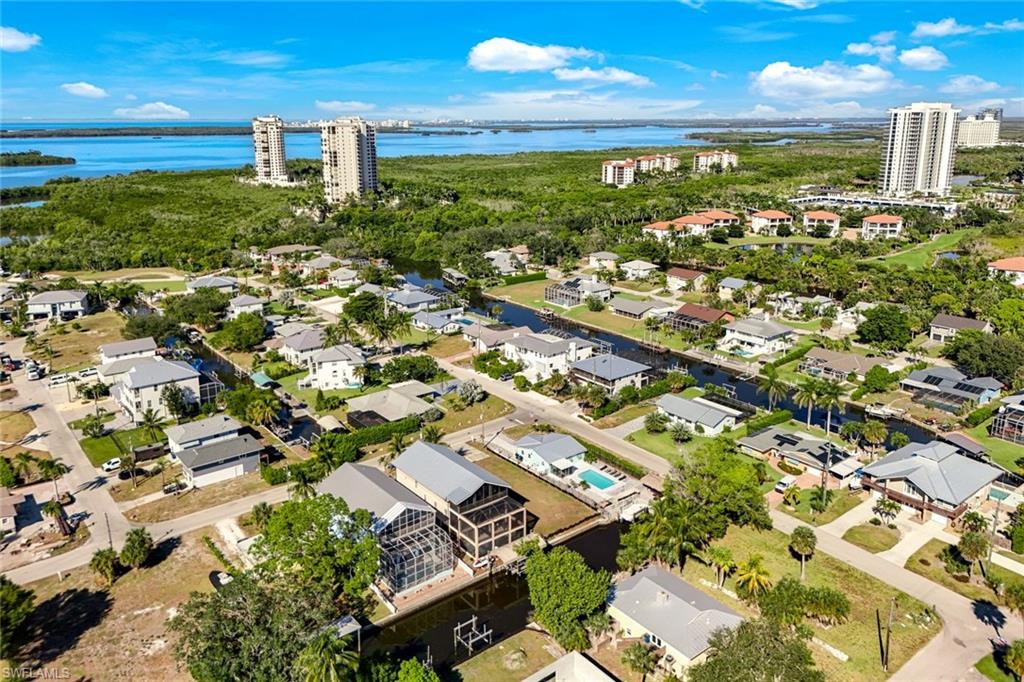 View of urban area featuring a nearby body of water