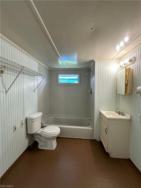 Full bathroom featuring washtub / shower combination, vanity, and toilet