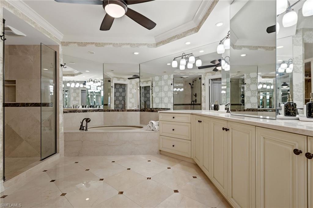 Primary Bathroom with Tub, Shower and Water Closet