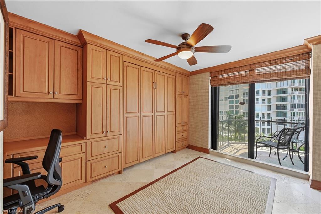 Den with Desk, Open Balcony and Murphy Bed