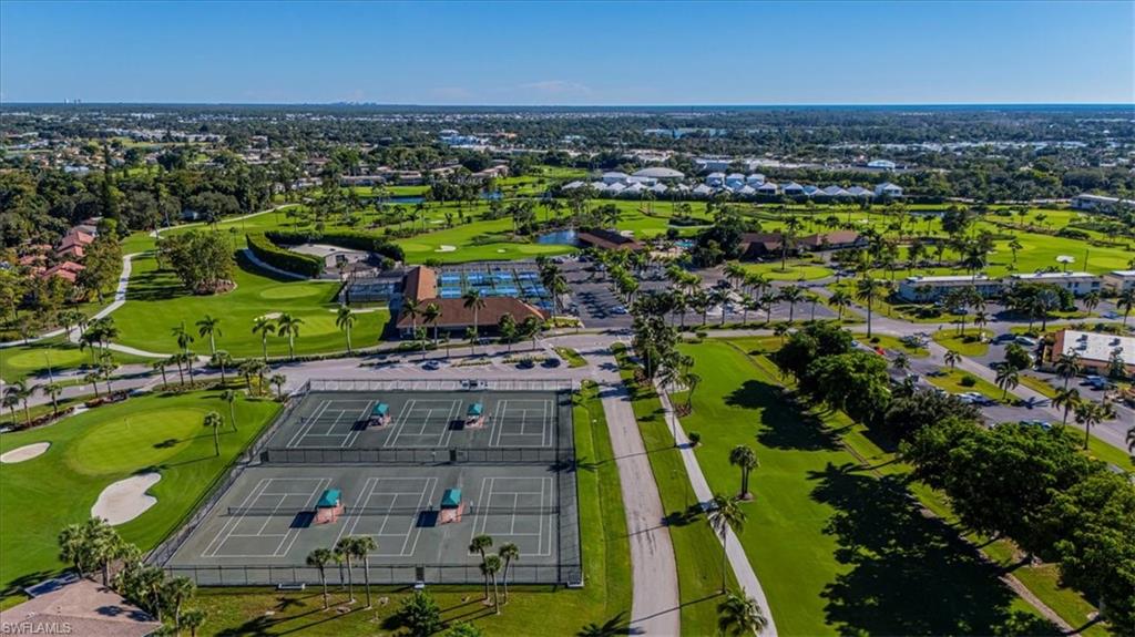 Aerial perspective of suburban area with a golf course
