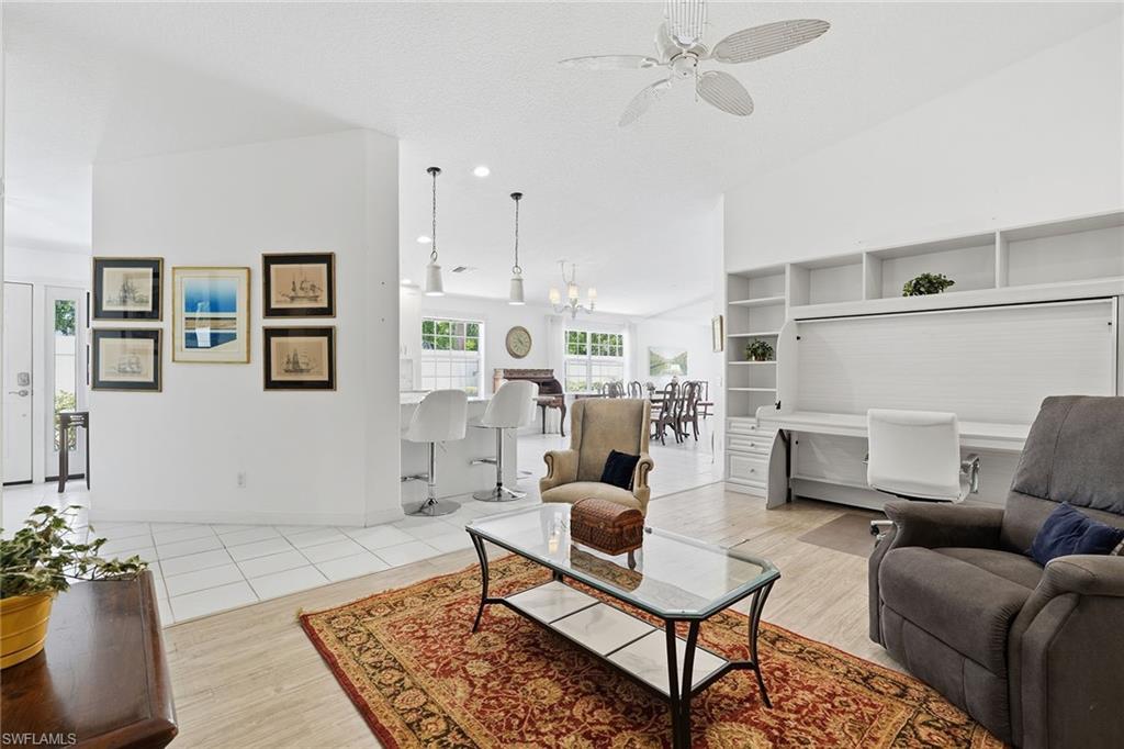 Family room which currently has a desk/murphy bed in for extra visitors if needed