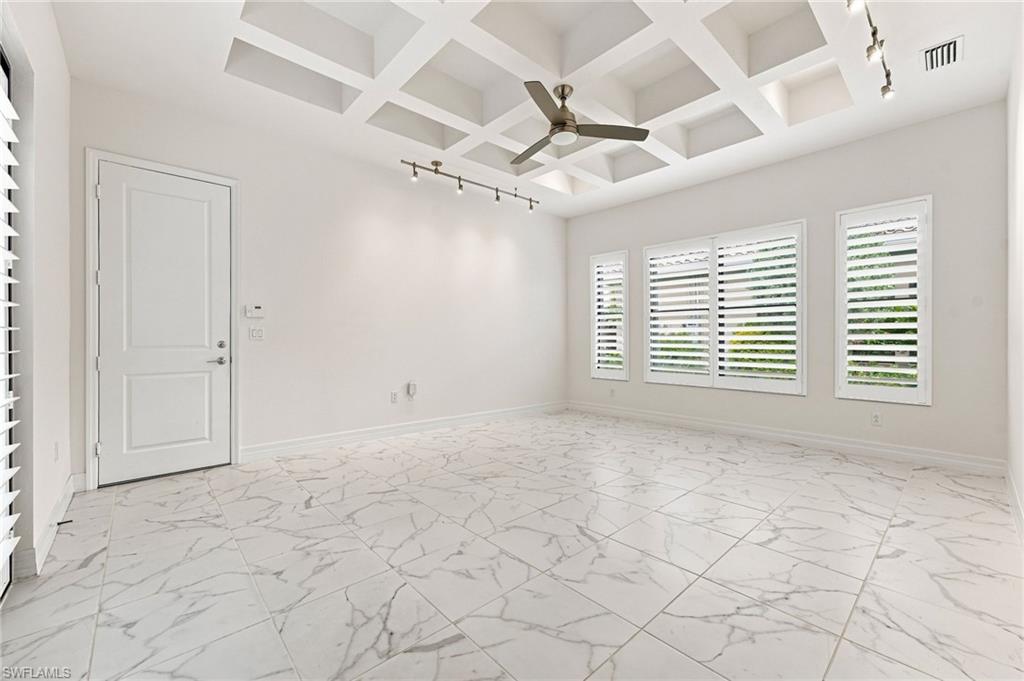 Club room with exterior french doors and access to single car garage