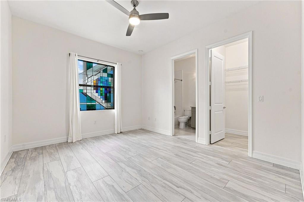 3rd bedroom with ensuite bathroom and walk-in closet, Pergo flooring.