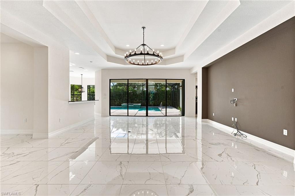 Open great room with accent wall