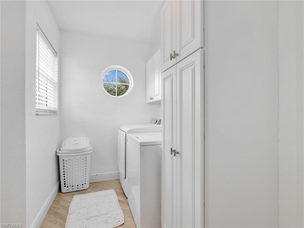 White cabinetry with brushed nickel hardware