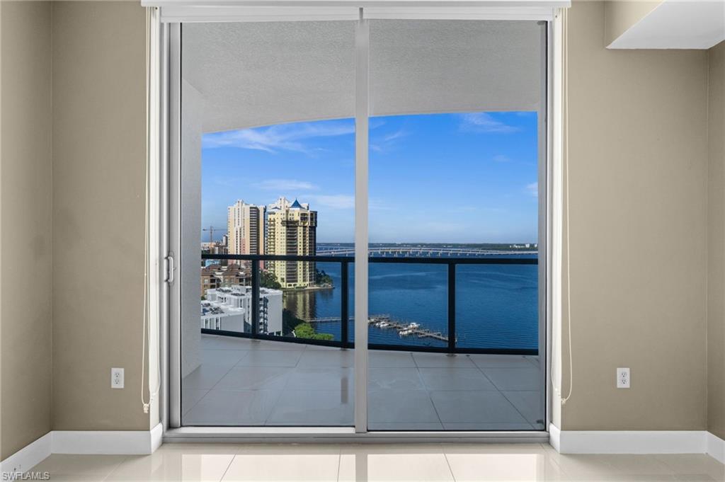Welcome to this Miami style condo - the most contemporary building in Fort Myers!