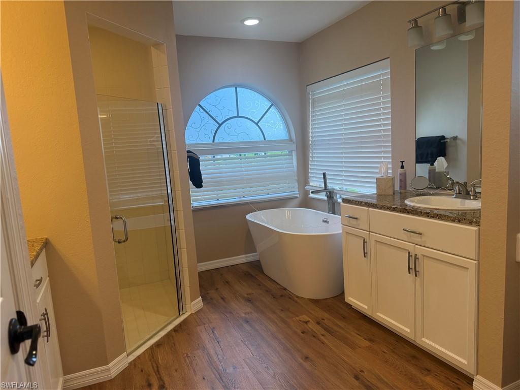 Separate tub and shower and separate sinks and vanities.