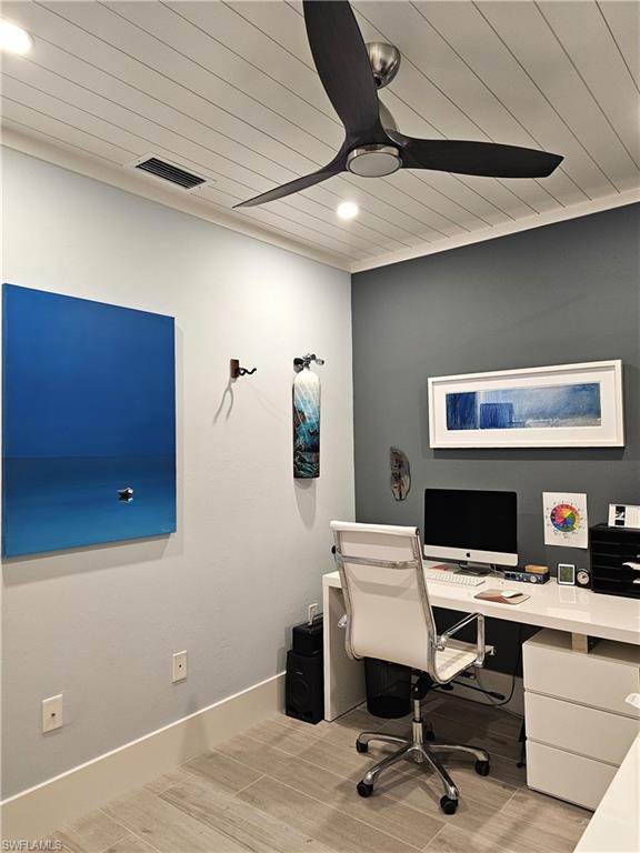 Office with wood ceiling, light wood-style flooring, ceiling fan, and recessed lighting