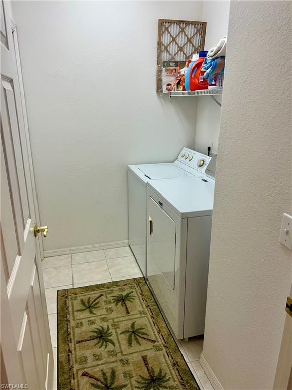 Dedicated laundry area featuring a shelf and tile flooring