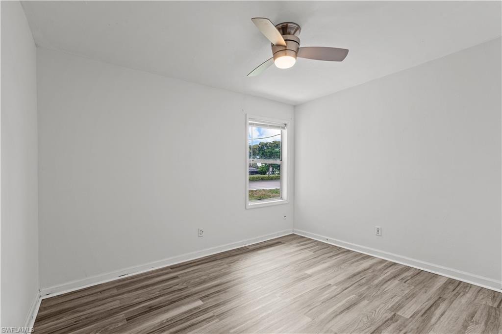 bedroom featuring ceiling fan and hardwood / wood-style floors