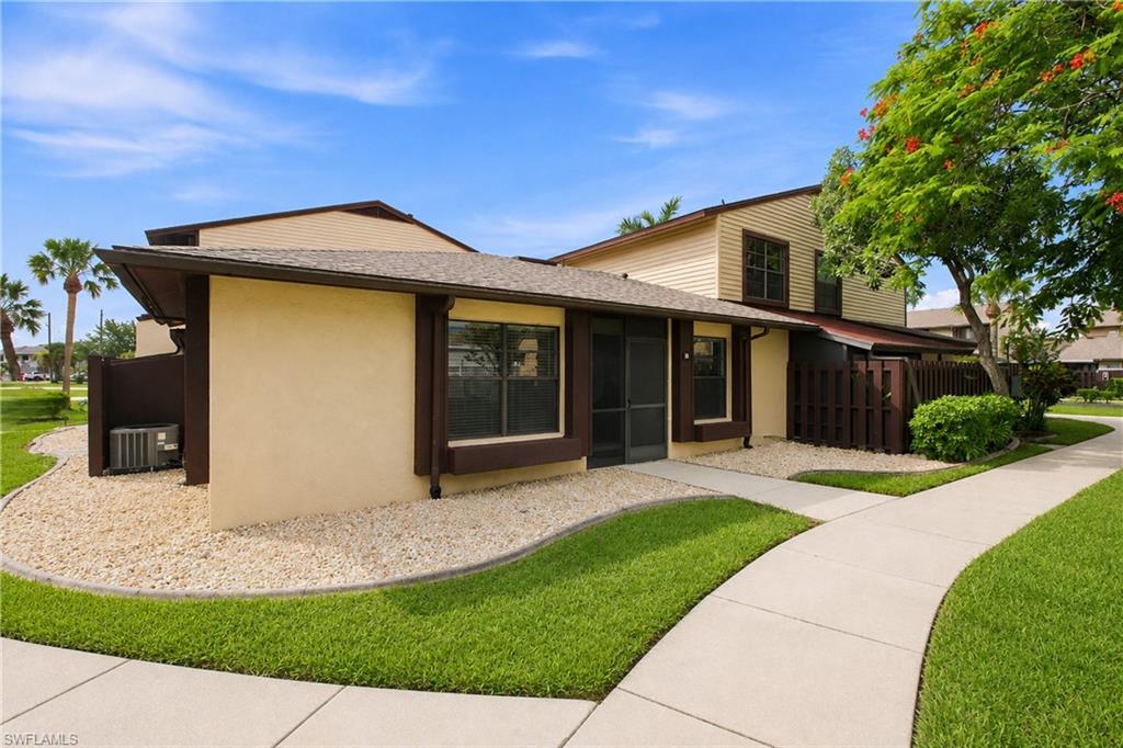 Welcome home! This charming end-unit townhome features low-maintenance rock landscaping and beautiful curb appeal.