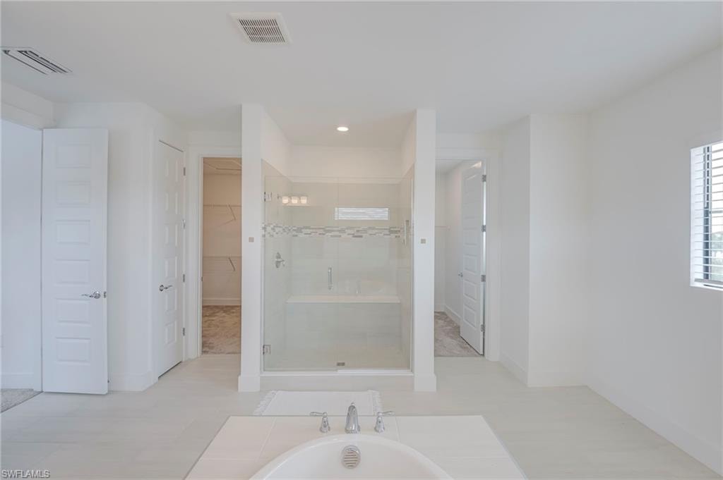2 closets in primary bathroom