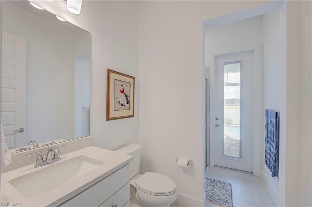 Full bathroom with access to Pool/Lanai.