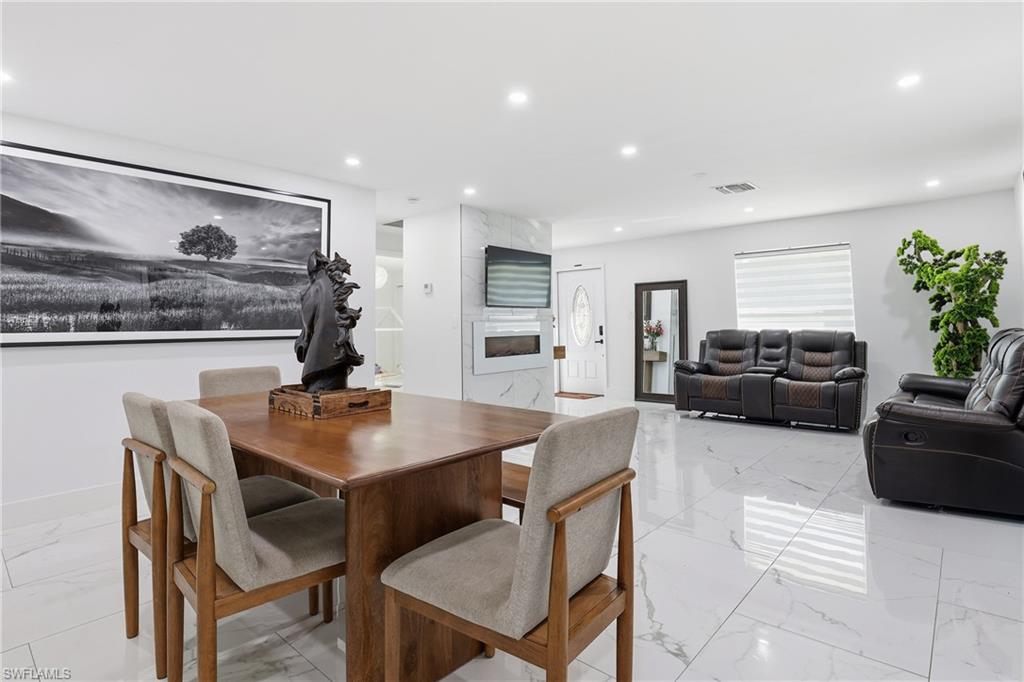 White porcelain tile flooring throughout