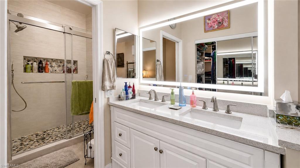 Dual vanity with integrated sinks and stone-finish countertop