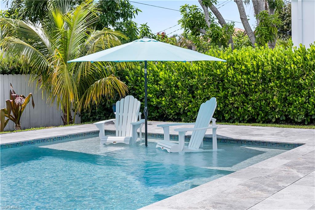 New Pool with Tanning Shelf, Adirondack Chairs and Umbrella