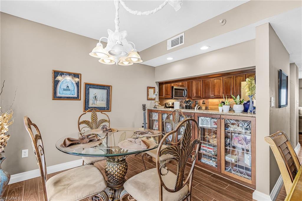 BREAKFAST ROOM JUST OFF OF THE KITCHEN AREA.