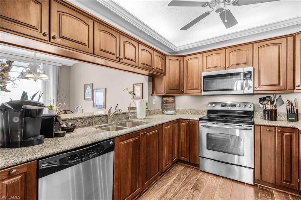 ALL UPDATED STAINLESS APPLIANCES WITH AMPLE COUNTER AND CABINET SPACE.