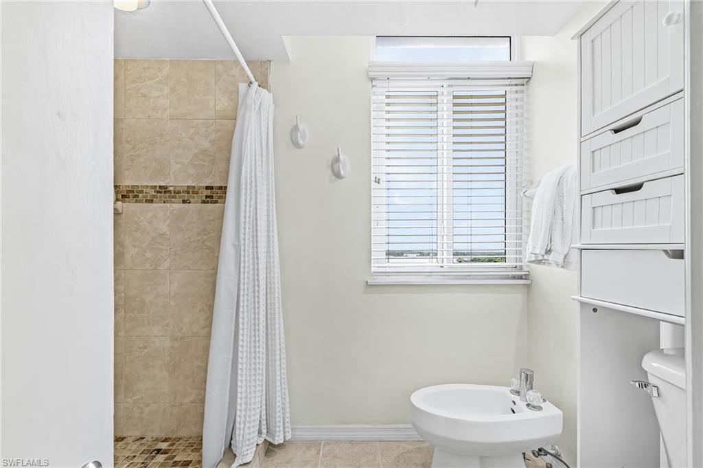 LARGE WALK-IN SHOWER AND ADDED BIDET.