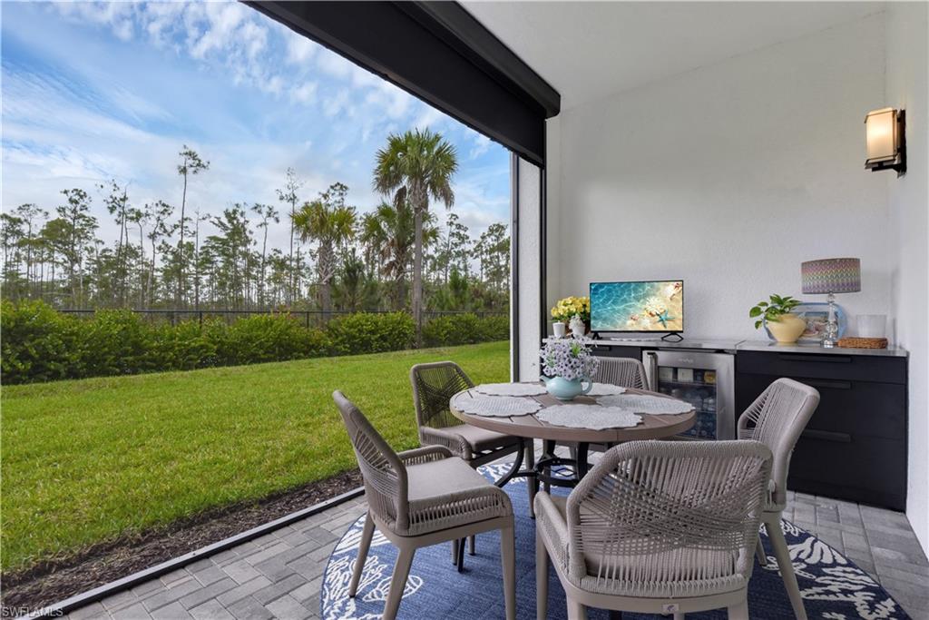 Summer Kitchen, Picture Window Screen, Electric Hurricane Screen + Impact Windows & Doors Throughout