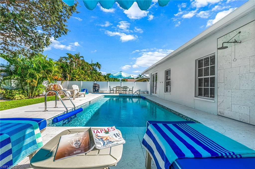 View of pool with a patio area