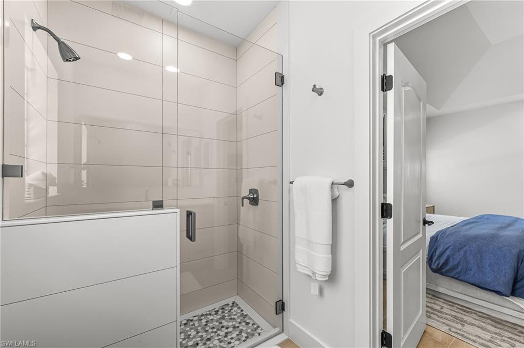 Ensuite bathroom with a stall shower