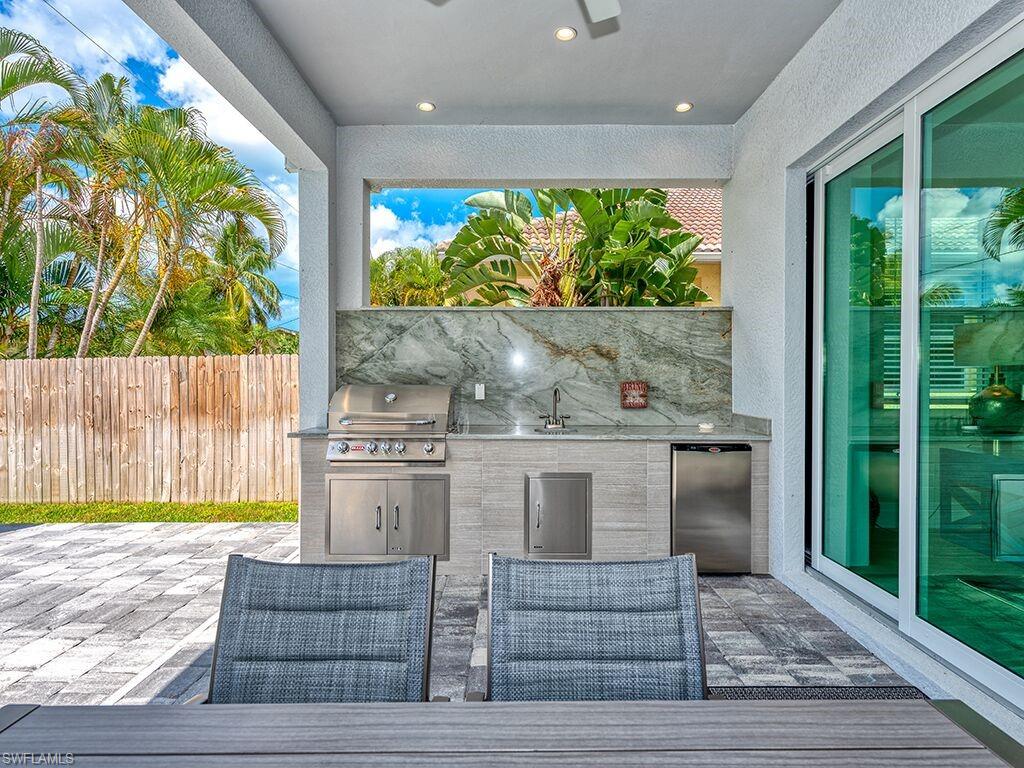 Lanai with outdoor kitchen