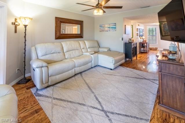Warm wood-finish flooring throughout the space