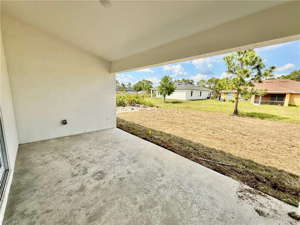 Covered porch in the rear.
