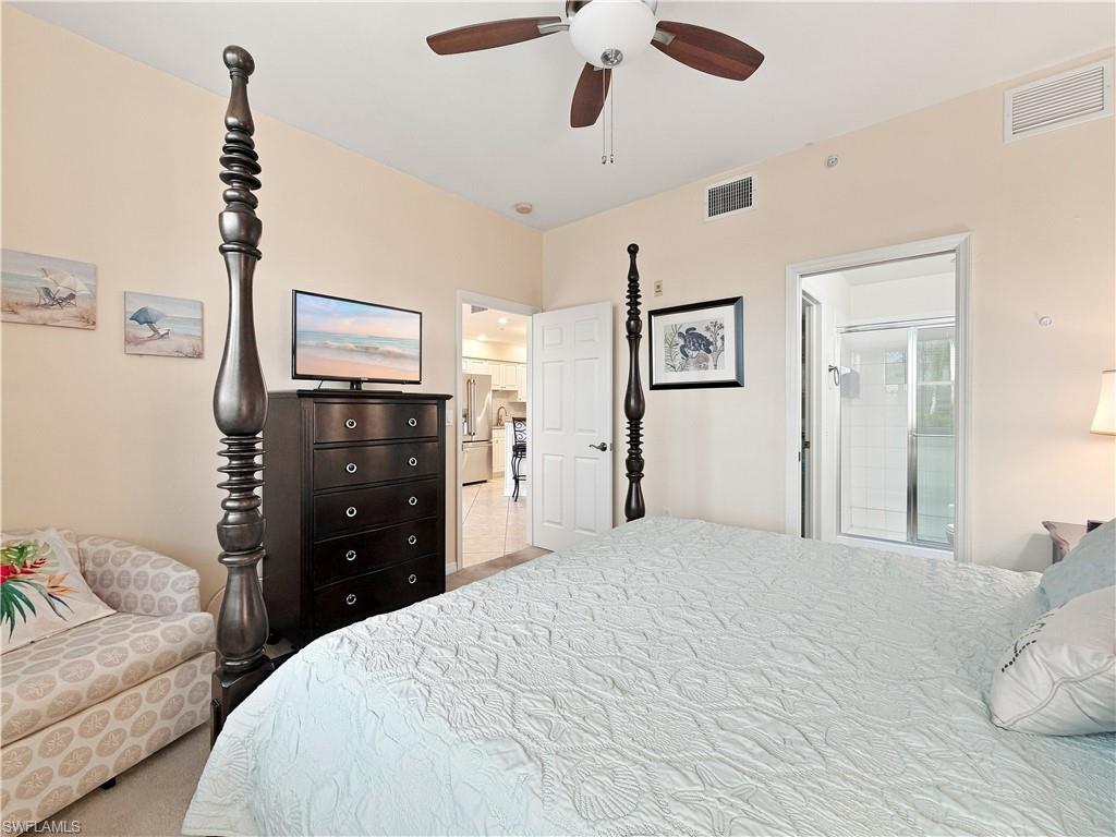 Recessed lighting, ceiling fan, and tile flooring