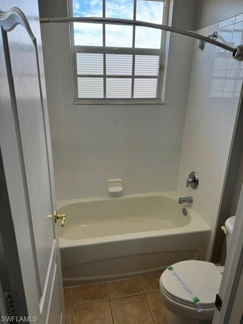 White tiled shower surround with an integrated bathtub, chrome fixtures, and a window with privacy blinds