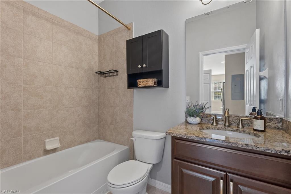 Tiled shower surround with a built-in tub