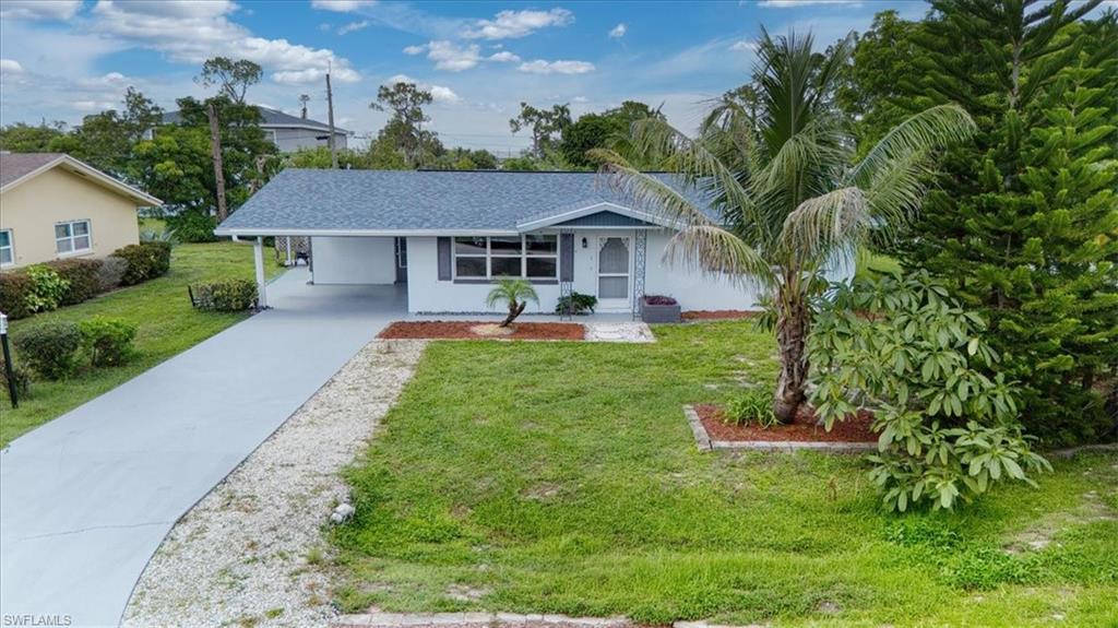 Single-story residence with a covered carport