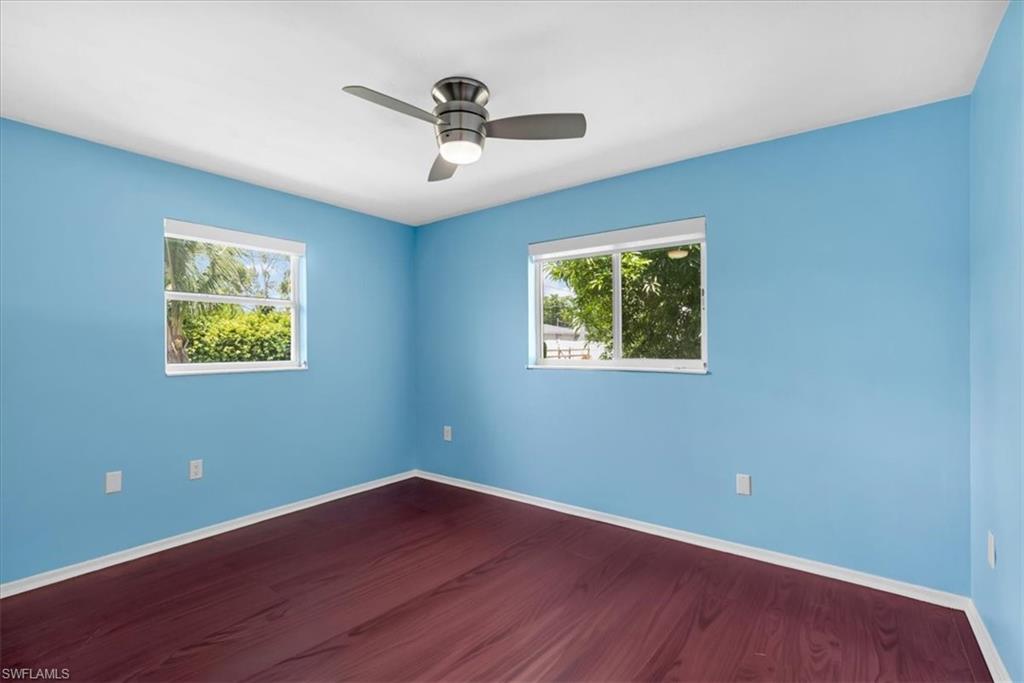 Wood-finish flooring with crisp white trim