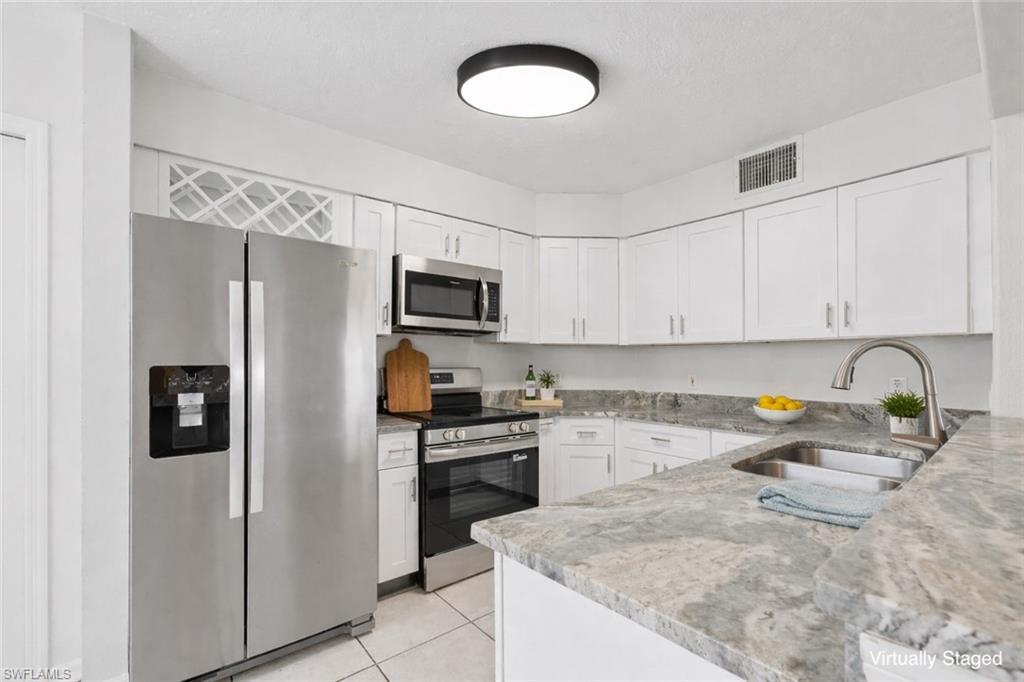 This image has been virtually staged for illustrative purposes. Furniture and décor shown are digital and are not present in the home and Lighting fixtures has been modified in photo. Room sizes and furniture scale may not be exact.