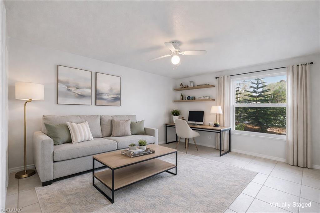3rd Bedroom can also be used as a bedroom/office with pull out sofa bed. This image has been virtually staged for illustrative purposes. Furniture and décor shown are digital and are not present in the home. Room sizes and furniture scale may not be exact.