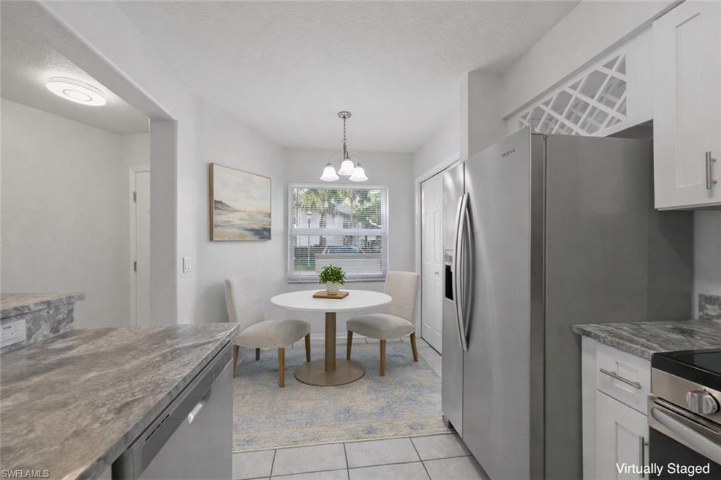 Breakfast nook with pantry. This image has been virtually staged for illustrative purposes. Furniture and décor shown are digital and are not present in the home. Room sizes and furniture scale may not be exact.