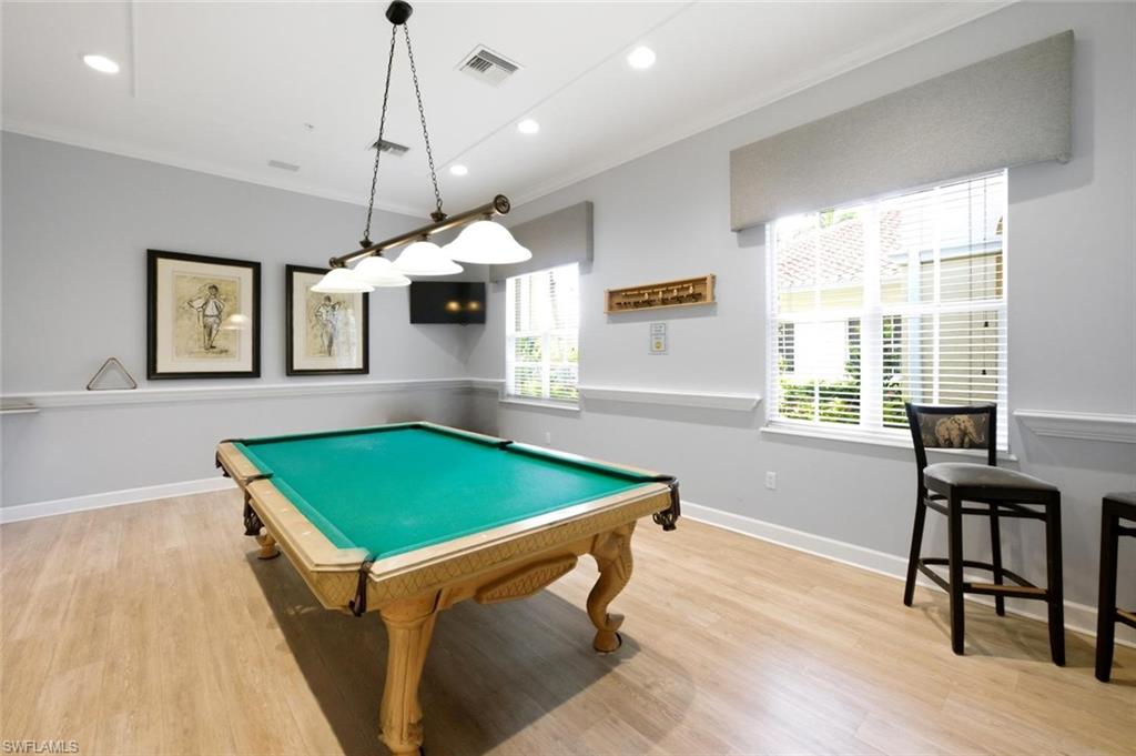 Recreational room featuring a billiards table, wood-finish flooring, recessed lighting, and windows with blinds
