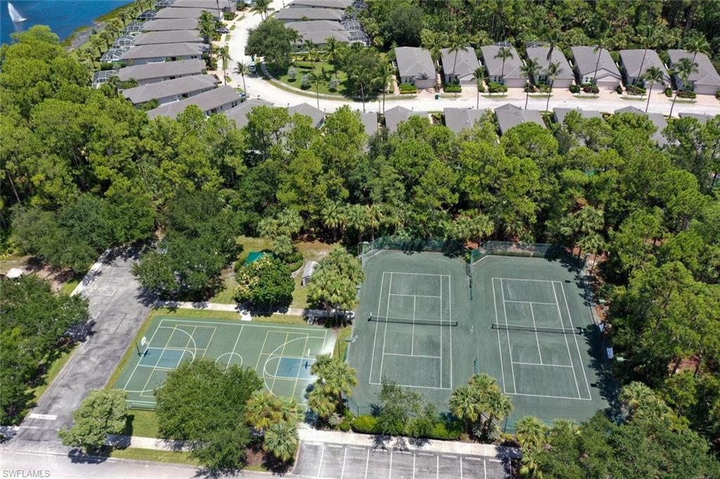 Community amenities include two tennis courts, a basketball court, and mature landscaping