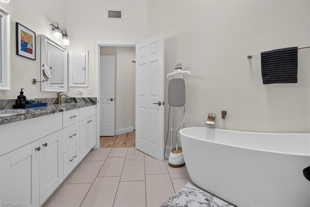 Primary bath with separate tub & shower