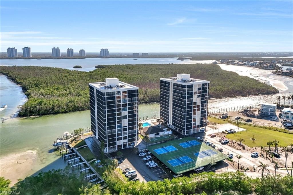 Twin high-rise structures featuring multi-story balconies