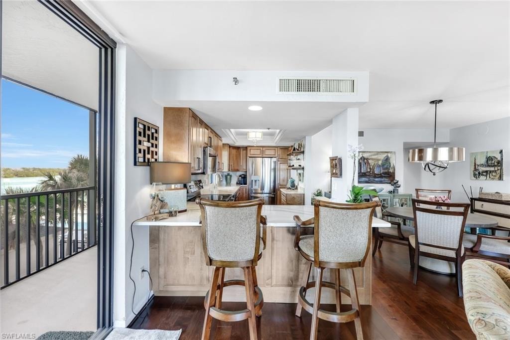 Wood-finish flooring throughout the main living areas