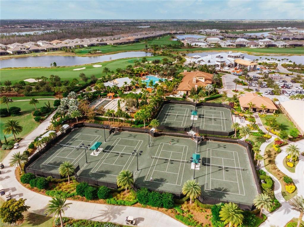 Six Har-Tru tennis courts, four pickleball courts, and lush landscaping