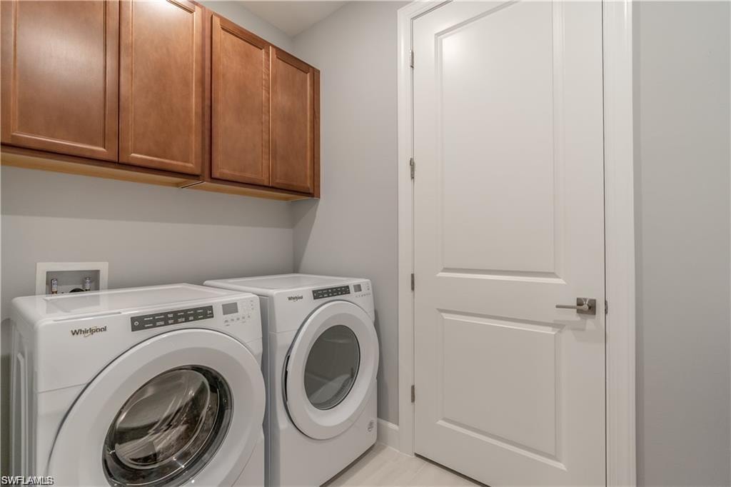 Built-in wood-finish cabinetry provides storage