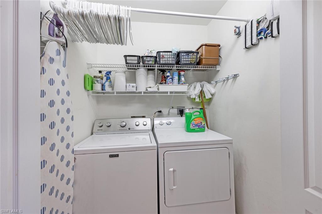 Washroom featuring separate washer and dryer